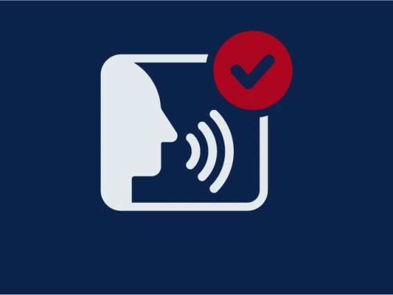 Icon showing a person speaking with a checkmark 
