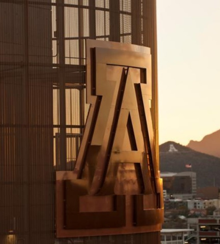 UArizona building sign during sunset